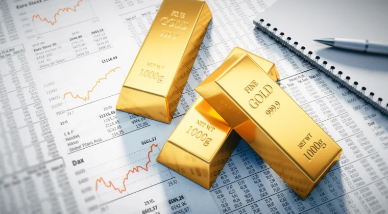 gold-bars-on-top-of-stock-market-newspaper-1-760x420